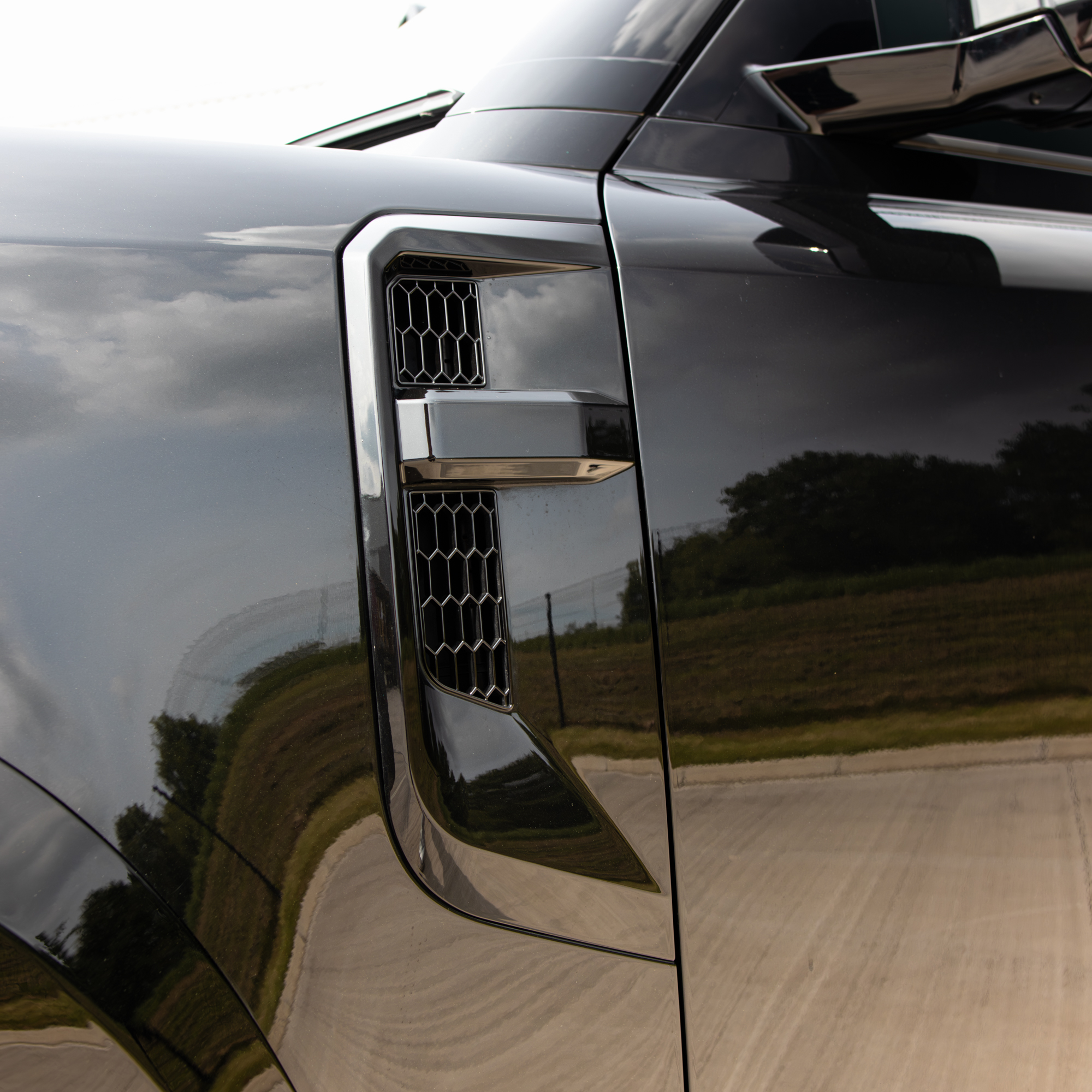 defender detailing on side grill of land rover