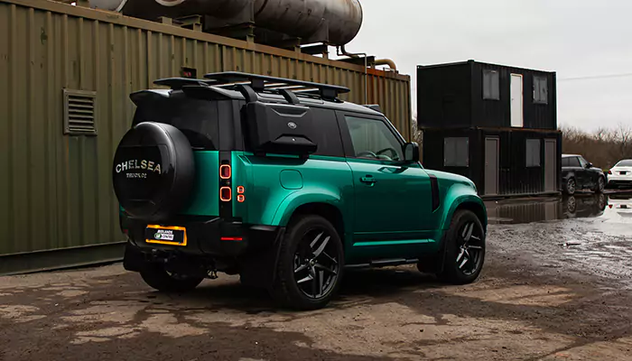 green wrapped defender with styling upgrades