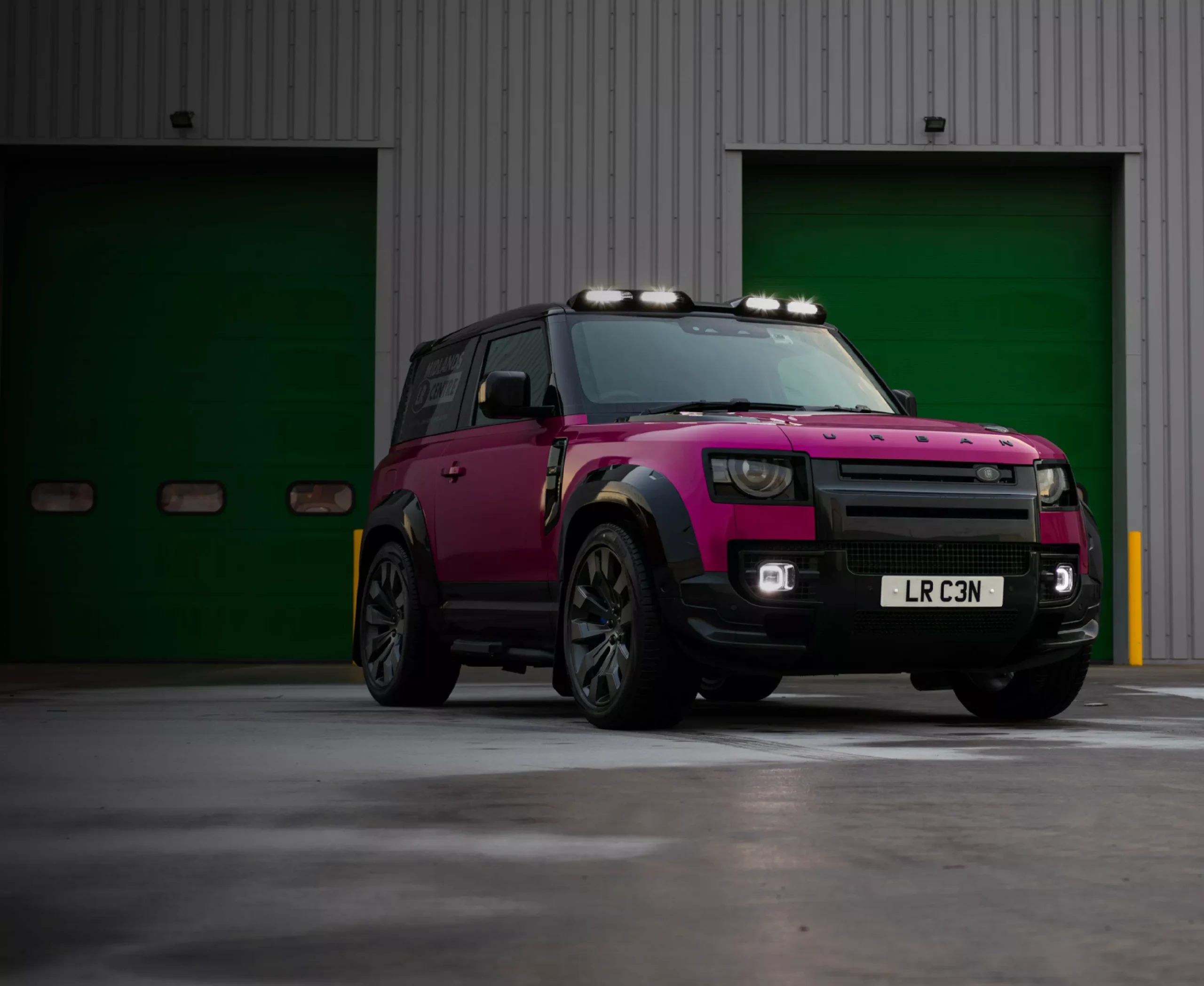pink wrapped land rover defender 90